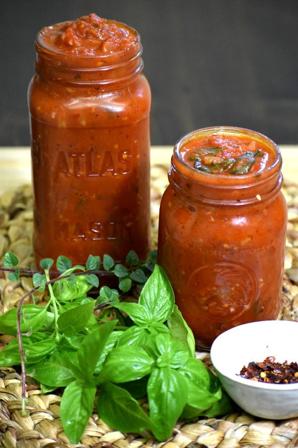 homemade marinara in two mason jars 