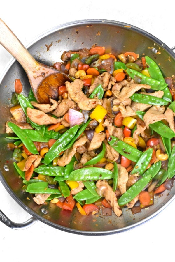 This easy Pork Stir Fry whips up in no time. Loaded with fresh veggies and tender pork, it's a perfect weeknight dinner idea!