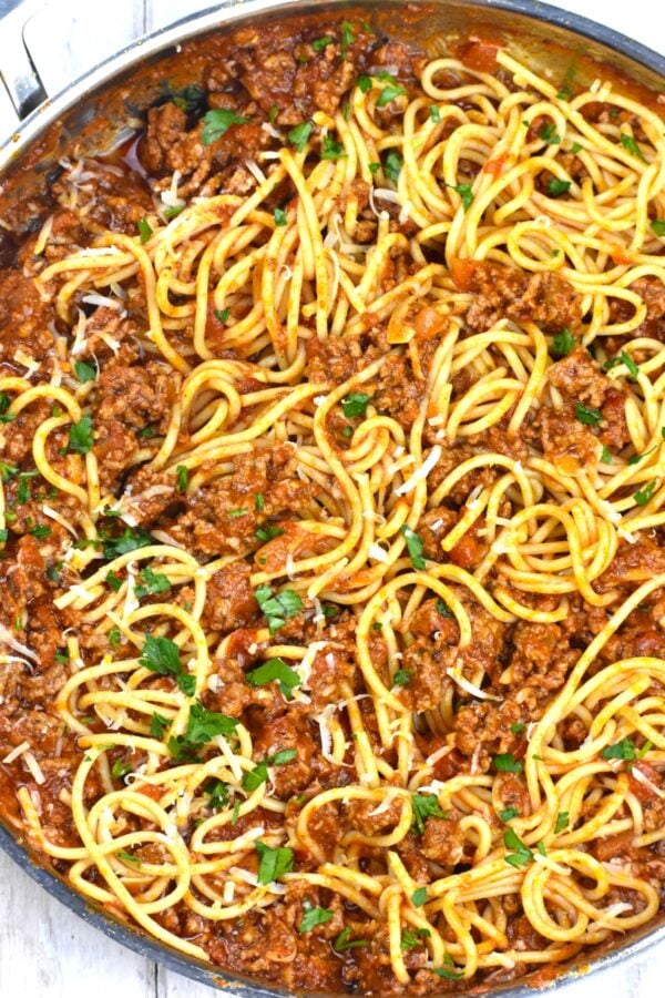 Spaghetti with Meat Sauce, everyone's childhood favorite. It can be a quick weeknight meal, or the sauce can simmer for hours.