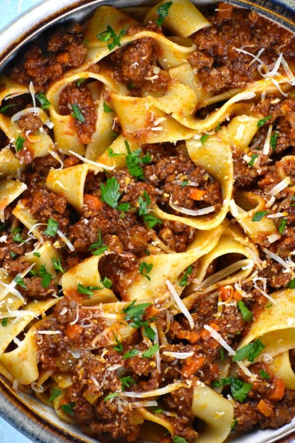 This Lamb Ragu is an incredibly flavorful and comforting Italian sauce. Tender ground lamb is simmered low and slow in a well seasoned tomato sauce.