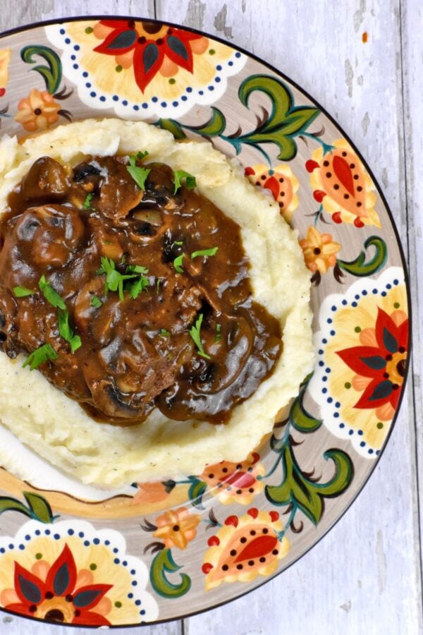 Serving of salisbury steak on the Gypsy Plate.