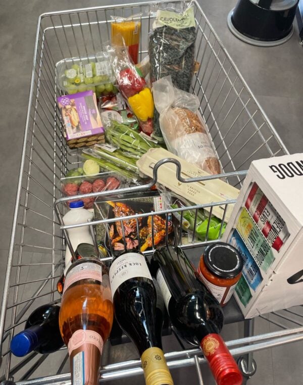 a shopping cart full of groceries