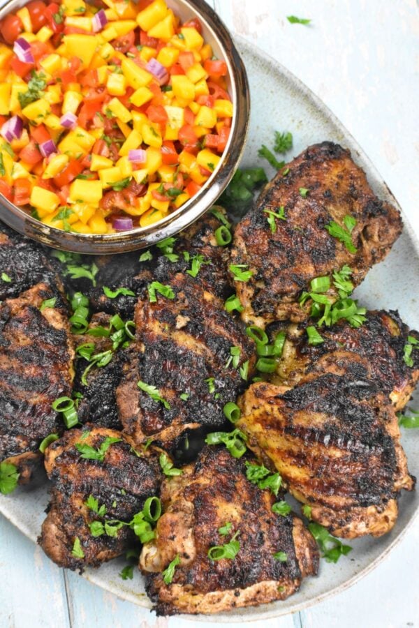 This authentic Jamaican Jerk Chicken recipe is marinated and cooked to perfection. It’s a total flavor bomb with customizable level of kick.