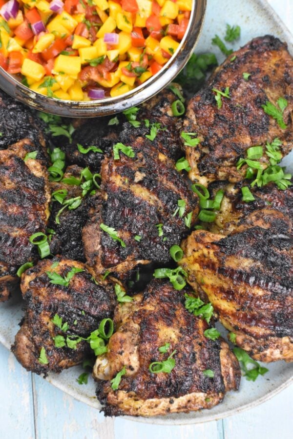 This authentic Jamaican Jerk Chicken recipe is marinated and cooked to perfection. It’s a total flavor bomb with customizable level of kick.