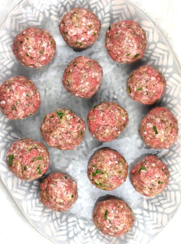 raw meatballs on a platter