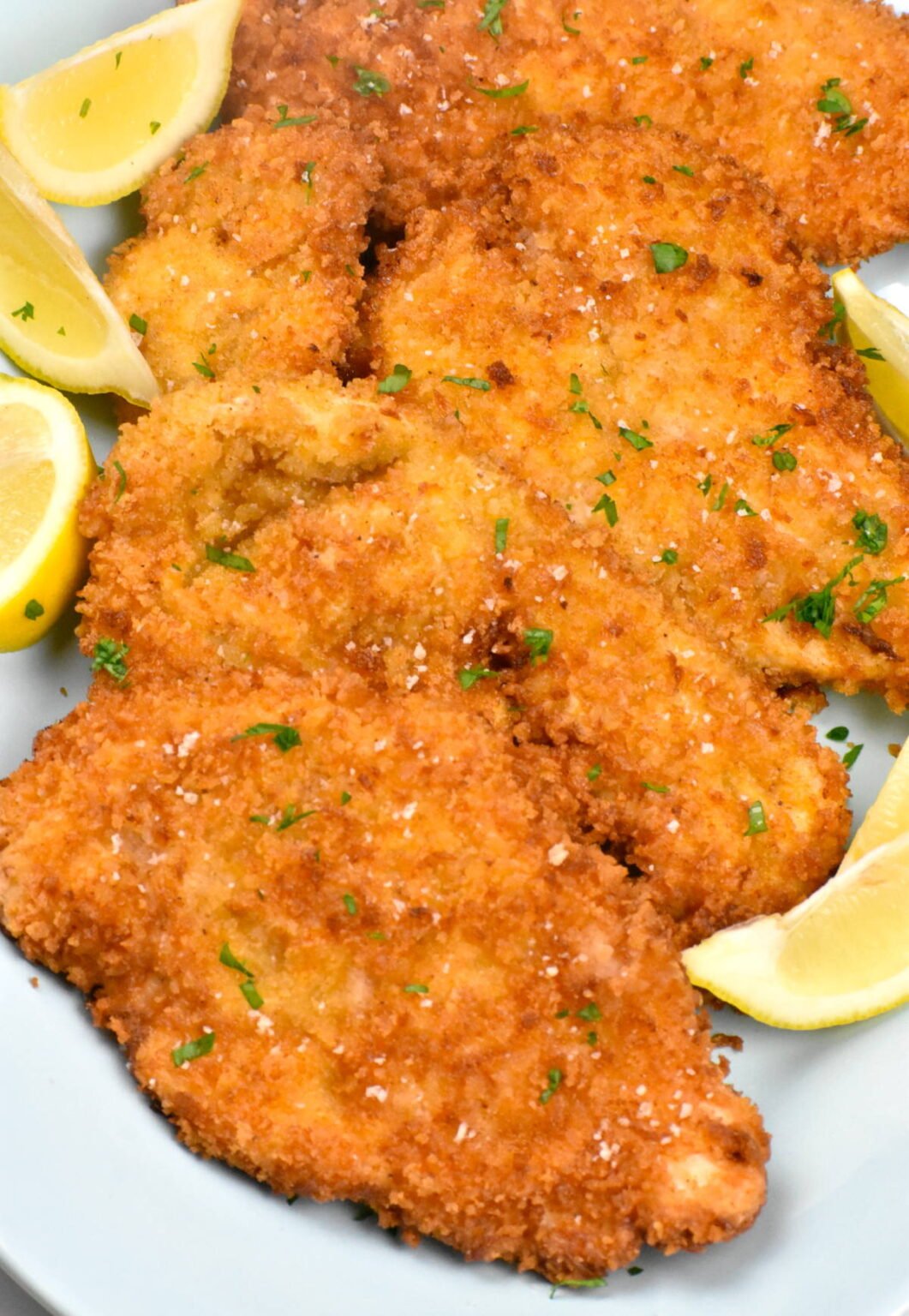 Platter full of chicken schnitzel.