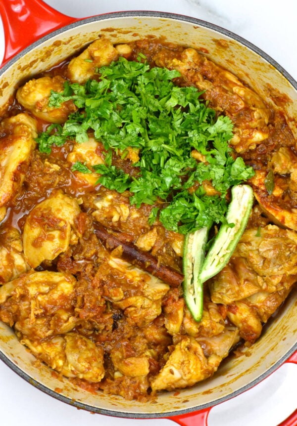 Chicken and cilantro added to pot.