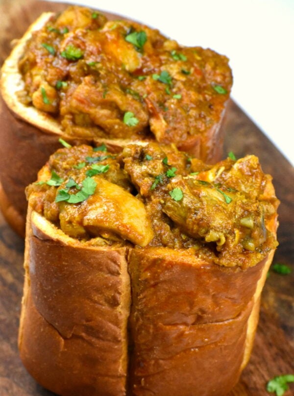Bunny chow on a cutting board.