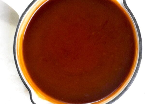 Preparing balsamic glaze.
