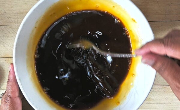 Mixing the stir fry sauce.