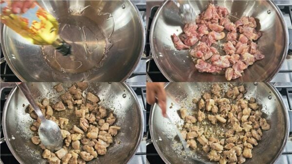 Sautéing chicken in a wok.