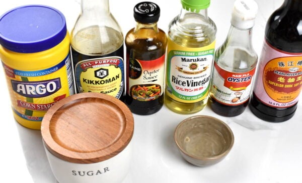 Ingredients for stir fry sauce arranged on a platform.
