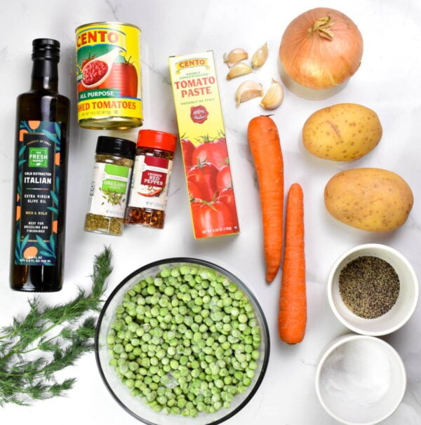 Greek pea stew ingredients, as listed below.