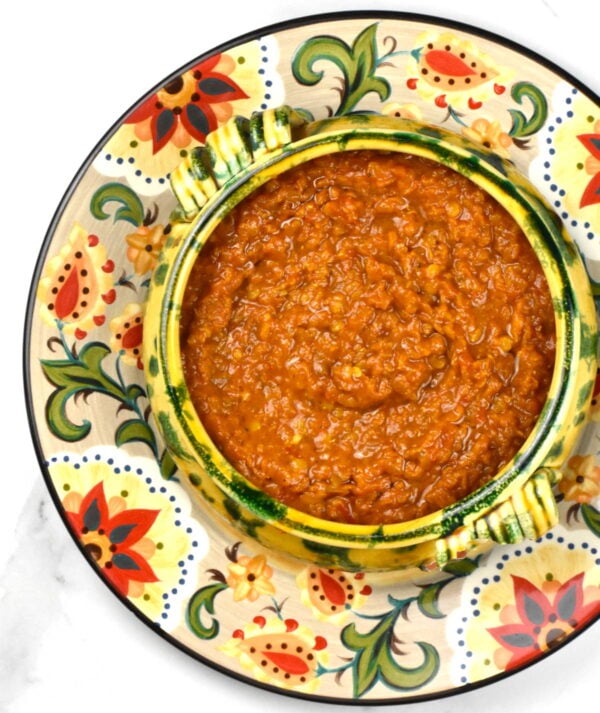 Bowl of misir wat atop the Gypsy Plate.