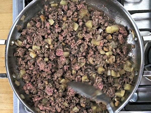 Browning ground beef.