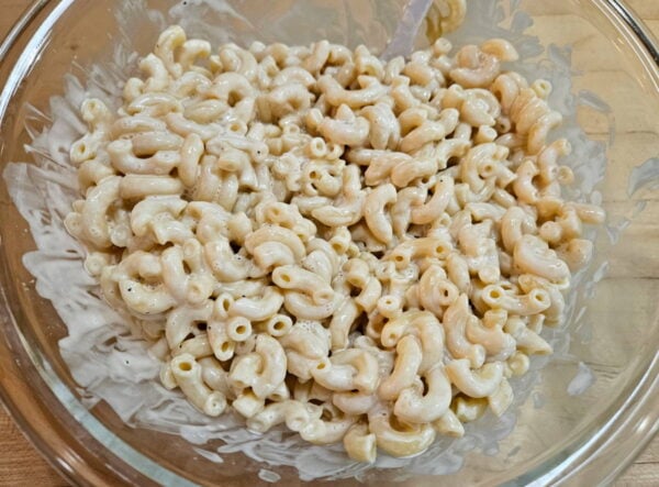 Pasta mixed with prepared dressing.