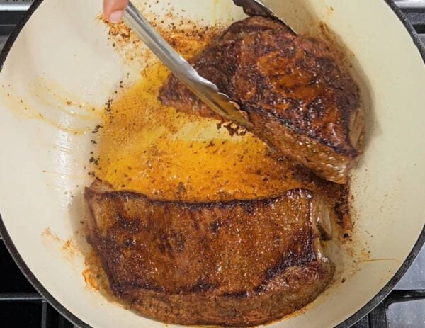 Searing the beef.