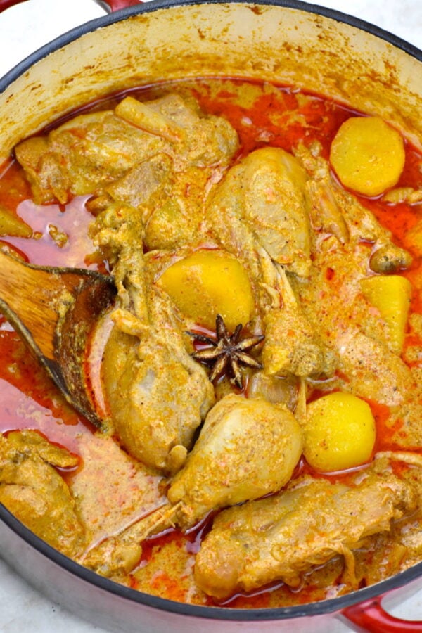 Potful of this red colored Thai chicken curry.