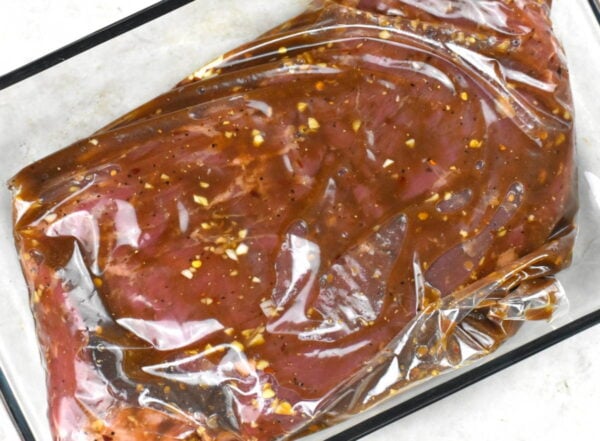 marinating the steak in a zip top bag.
