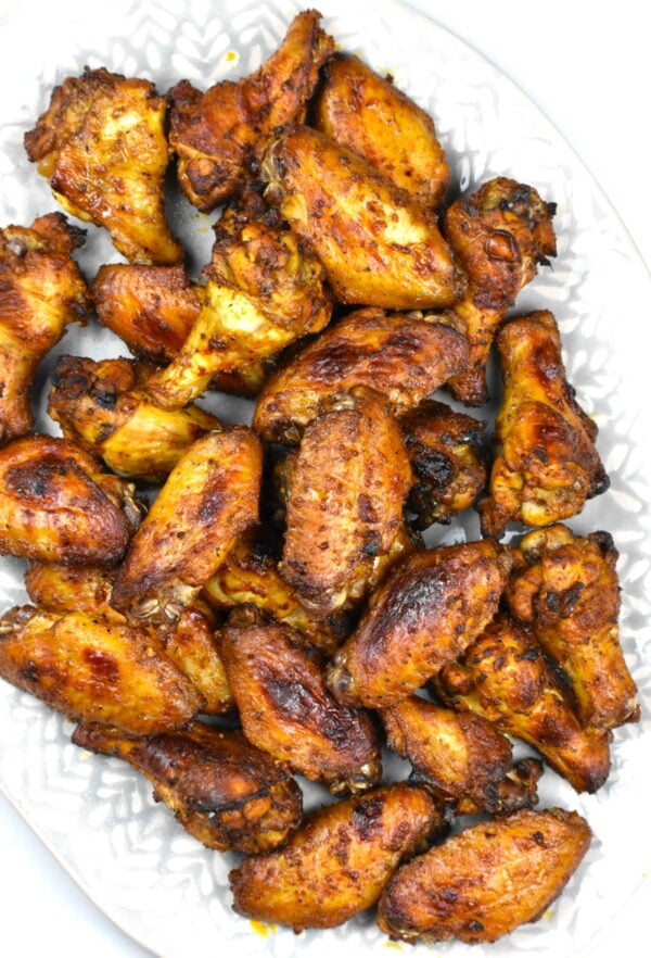 Peruvian chicken wings on a platter.