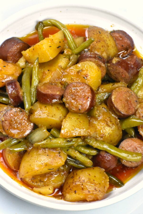 Bowl of slow cooker smothered potatoes.