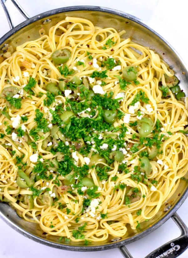 skillet full of olive martini pasta