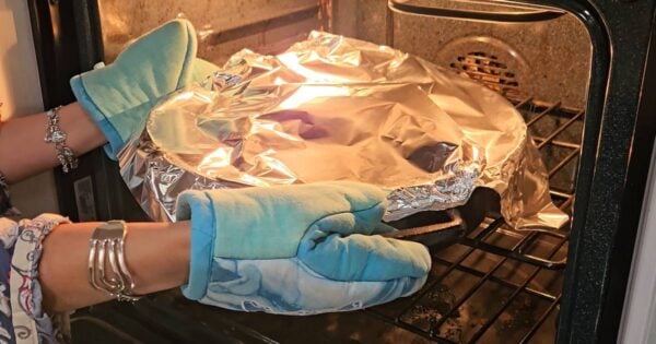 sticking the pan in the oven