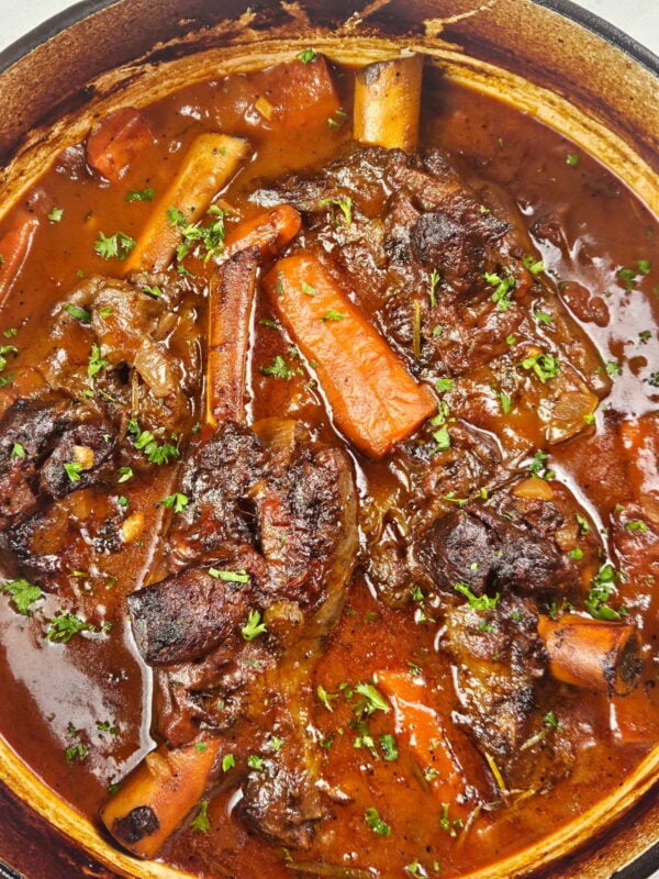 pot full of braised lamb shanks
