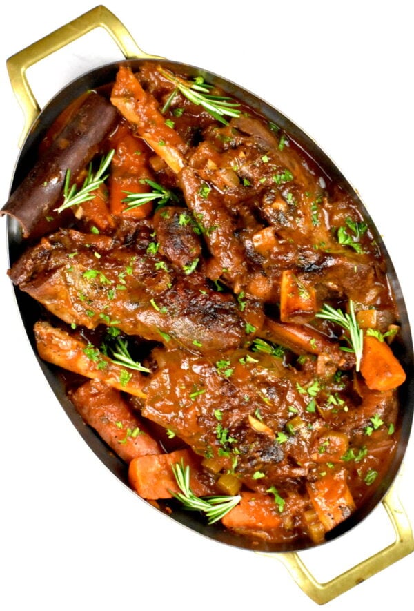 platter with lamb shanks and vegetables