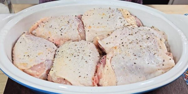 chicken thighs seasoned with salt and pepper