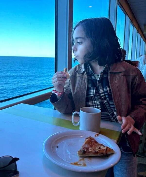 noah looking out the cruise ship window