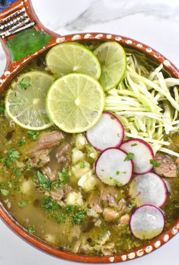 a bowl of white pork pozole