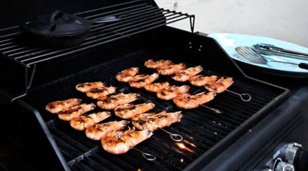 grilling the shrimp skewers
