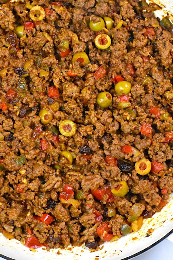 close up shot of cuban ground beef with olives and raisins