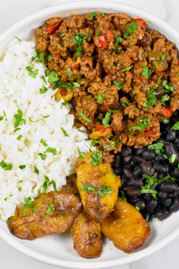 cuban picadillo served with rice and beans