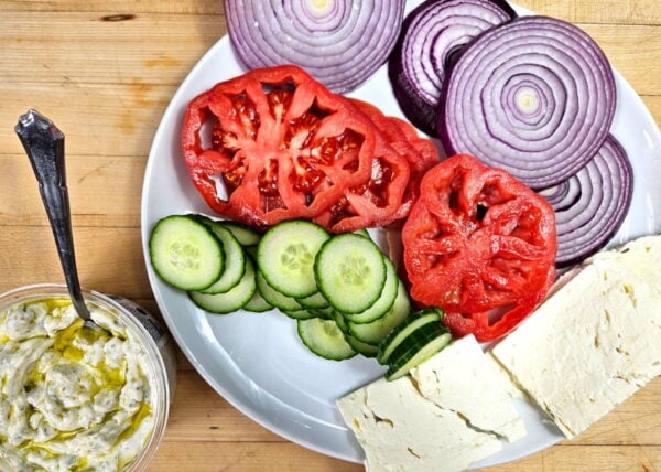 prepared burger toppings on a plate