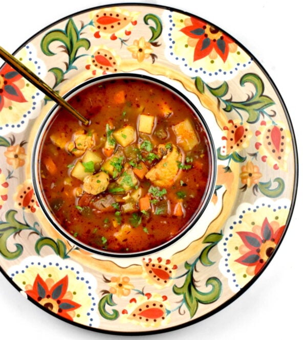 Bowl of Bermuda fish chowder atop the Gypsy Plate.