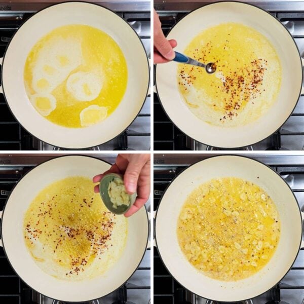Cooking crushed red pepper and garlic in a skillet full of melted butter.