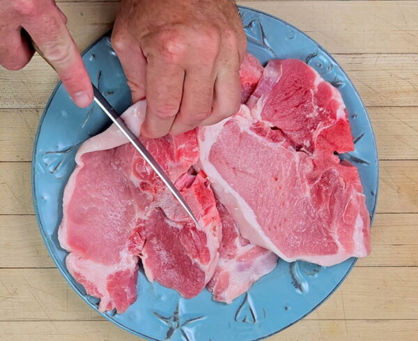 scoring the edges of the chops