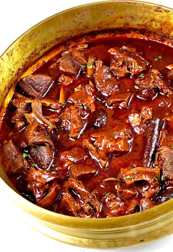 Rogan josh curry in a large pot.