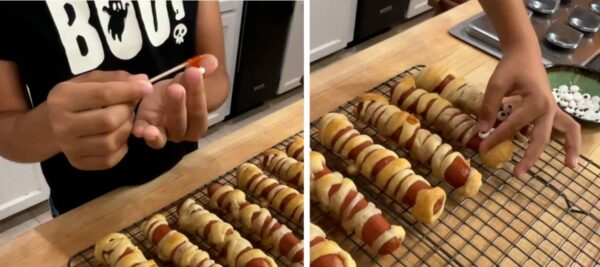 Adding eyes to the mummy dogs.